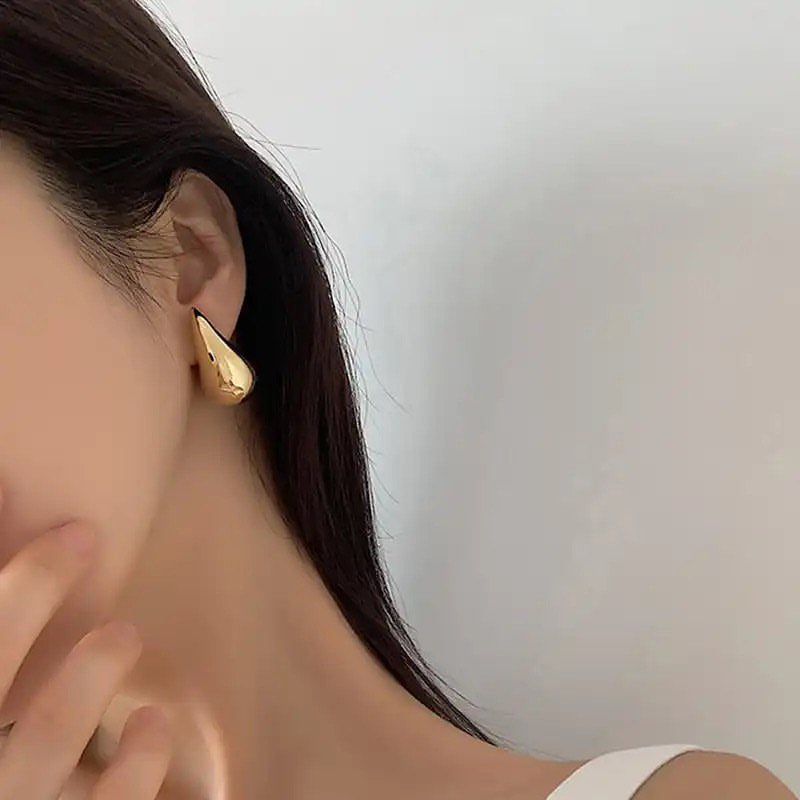 Gold bottega veneta earrings