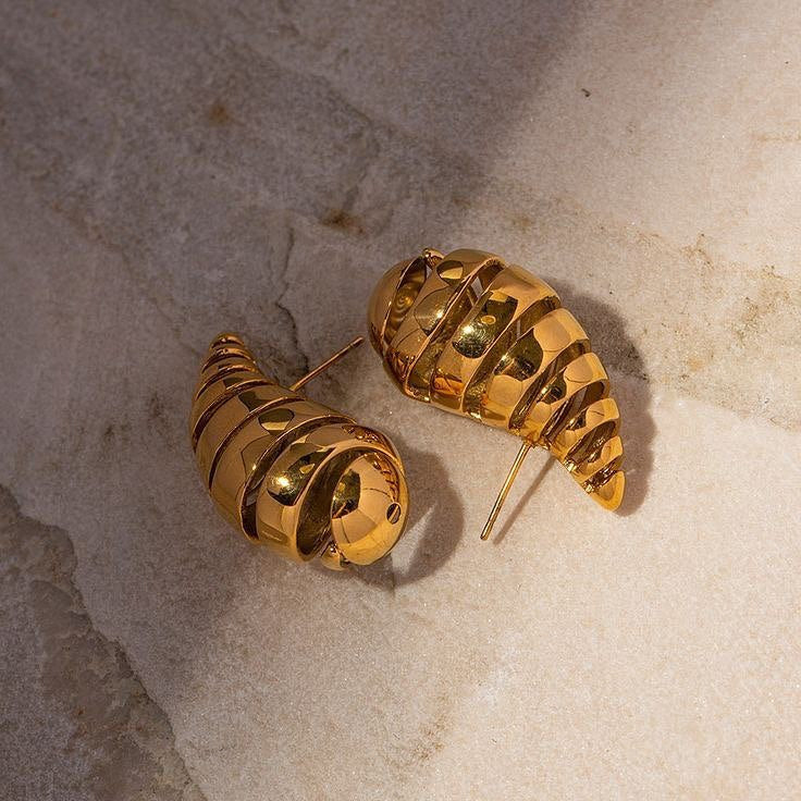 ‏Gold bottega veneta earrings
.