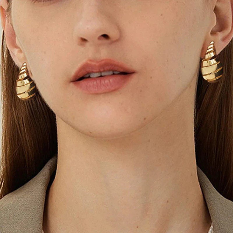 ‏Gold bottega veneta earrings
.