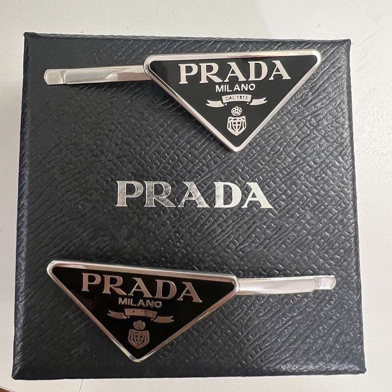 Prada hair clips